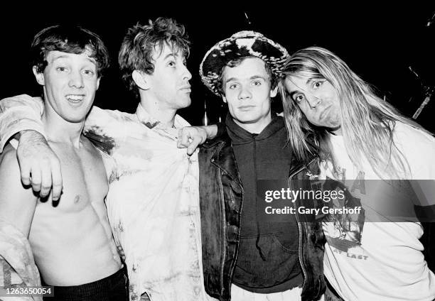 Portrait of the members of American Rock group Red Hot Chili Peppers as they pose together before a sold-out performance at the Ritz, New York, New...