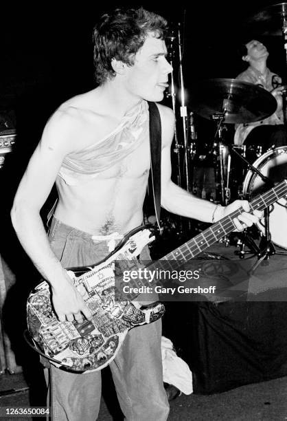 American Rock musician Flea , of the group Red Hot Chili Peppers, plays bass guitar during a soundcheck before a sold-out performance at the Ritz,...