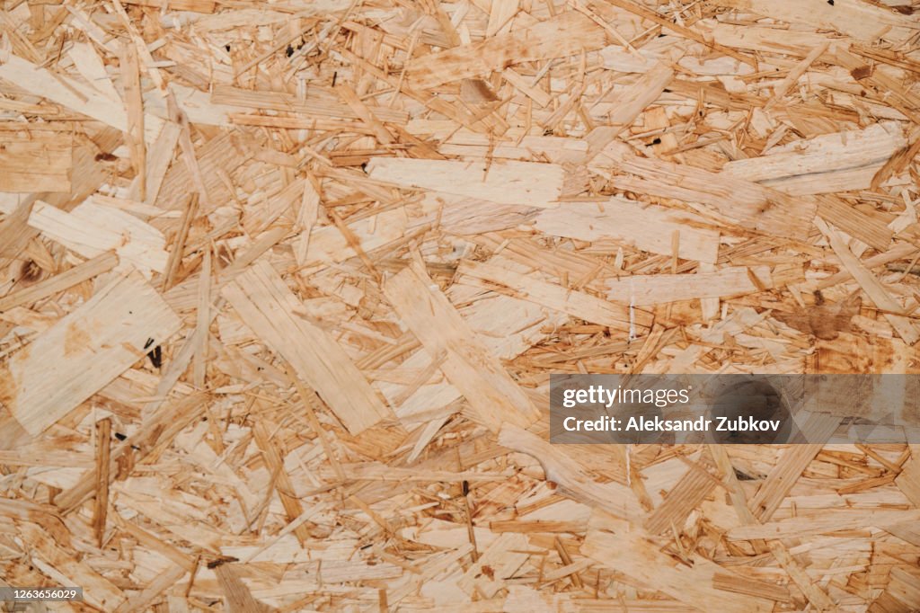 Pressed wooden Board. Textured background.