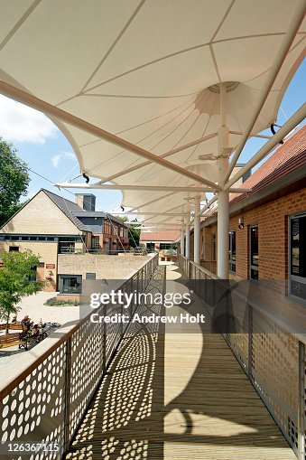 The Papworth Village Centre Canopy, Cambridgeshire. The structure provides sheltered access and serves as a method of improving the image of the centre to visitors.