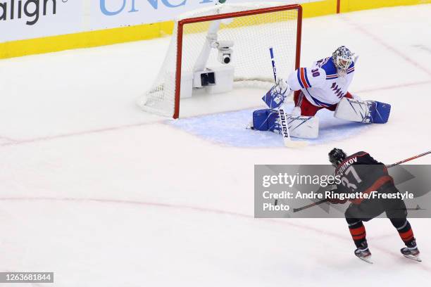 Andrei Svechnikov of the Carolina Hurricanes scores a hat-trick goal against the New York Rangers in Game Two of the Eastern Conference Qualification...