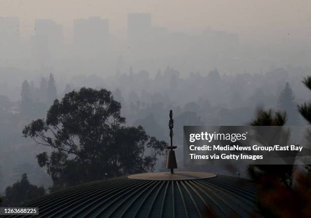 Smoke from Butte County's Camp Fire is seen over downtown Oakland in this view from the Mormon Temple in Oakland, Calif., on Thursday, Nov. 8, 2018....