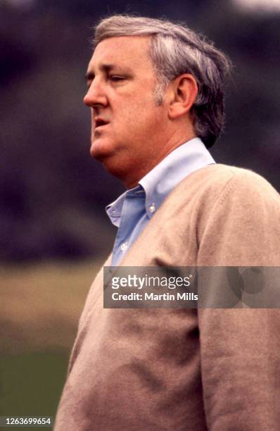 Sports Illustrated writer Dan Jenkins looks on during a celebrity golf event circa February, 1971.