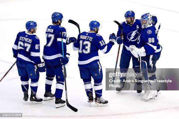 The Tampa Bay Lightning celebrate their win in the overtime shoot-out against the Washington Capitals in Game One of the Eastern Conference...