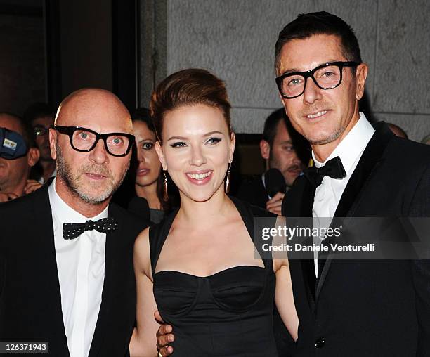 Actress Scarlett Johansson and designers Domenico Dolce and Stefano Gabbana attend a dinner at the Dolce & Gabbana Gold Restaurant as part Milan...