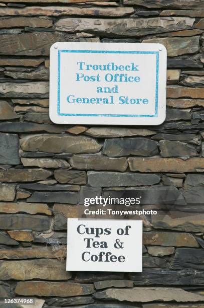 post office and teashop sign in troutbeck. - village post office stock pictures, royalty-free photos & images