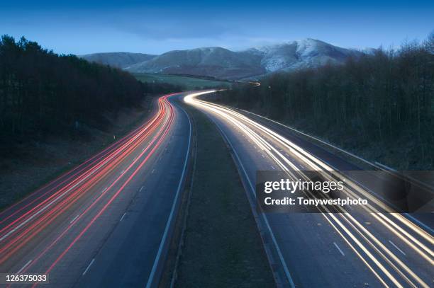 m6 motorway and howgill fells at night - dual fotografías e imágenes de stock