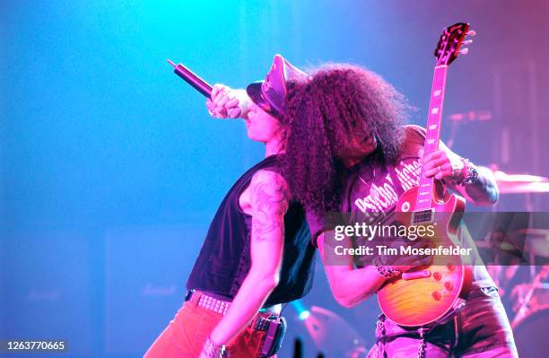Scott Weiland and Slash of Velvet Revolver perform at the Warfield theatre on June 7, 2004 in San Francisco, California.