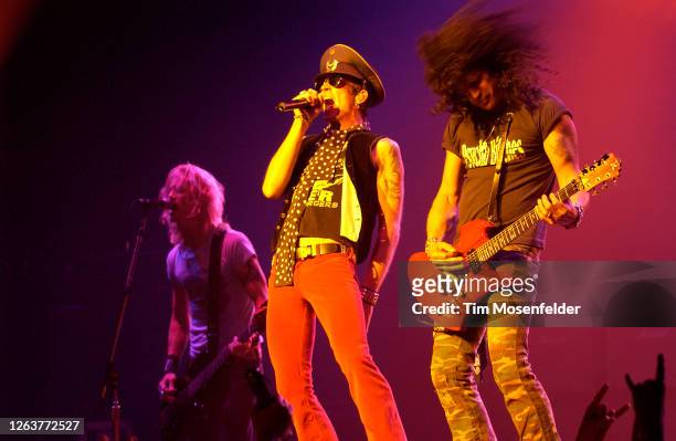 Duff McKagan, Scott Weiland, and Slash of Velvet Revolver perform at the Warfield theatre on June 7, 2004 in San Francisco, California.