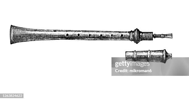 old engraved illustration of the french shawm - conical bore, double-reed woodwind instrument - oboe stock-fotos und bilder