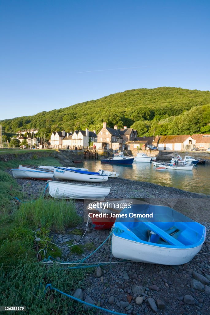 Small fishing boats in the harbour at Porlock Weir near Exmoor National Park.