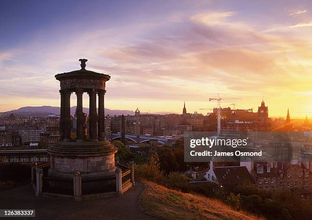 view of the city of edinburgh from carlton hill at sunset. - carlton stock pictures, royalty-free photos & images