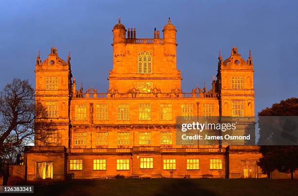 wollaton hall bathed in the last rays of winter sunshine near the city of nottingham. - nottingham stock pictures, royalty-free photos & images