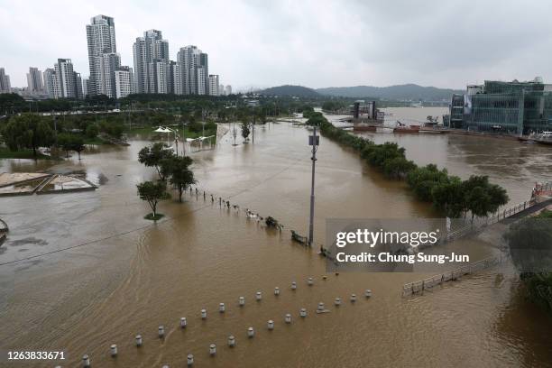 The flooded Han River park is seen after torrential rain on August 04, 2020 in Seoul, South Korea. Damage from heavy rain that pounded the country's...