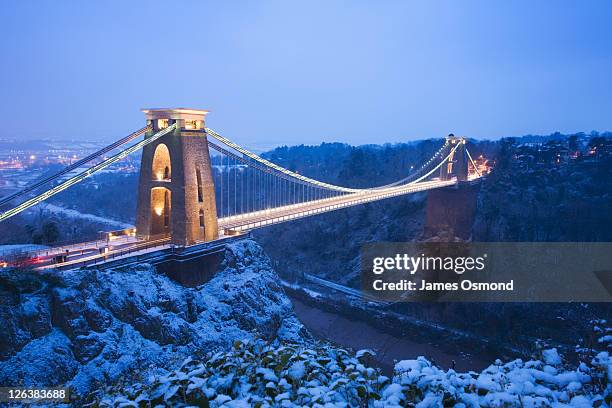 clifton suspension bridge at dusk in winter. bristol. england. uk. - clifton bridge stock pictures, royalty-free photos & images