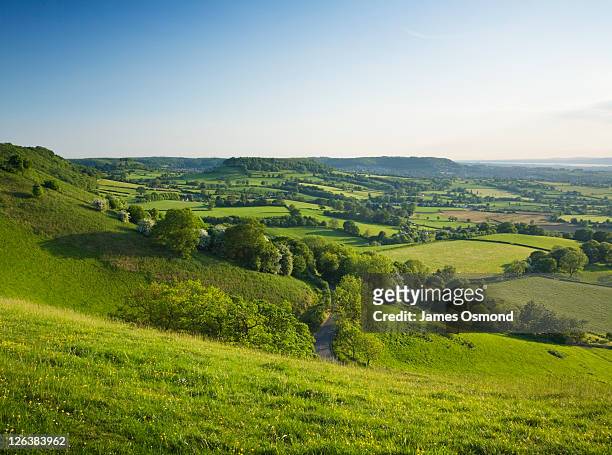 view from coaley peak towards dursley. the cotswolds. gloucestershire. england. uk. - gloucestershire stock pictures, royalty-free photos & images