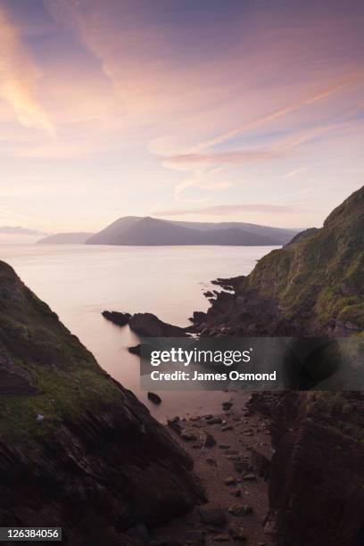 combe martin bay from sexton's burrow with the hogs-back cliffs of little hangman and great hangman in the distance. devon. england. uk. - hogsback stock pictures, royalty-free photos & images