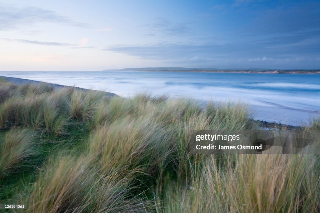 Northam Burrows Country Park at Dusk with Braunton Burrows in the Distance. Devon. England. UK