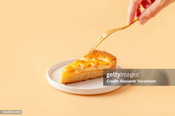 peach cake - fork stock pictures, royalty-free photos & images