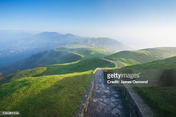 footpath on herefordshire beacon in the malvern hills. herefordshire & worcestershire. england. uk. - worcestershire stock pictures, royalty-free photos & images