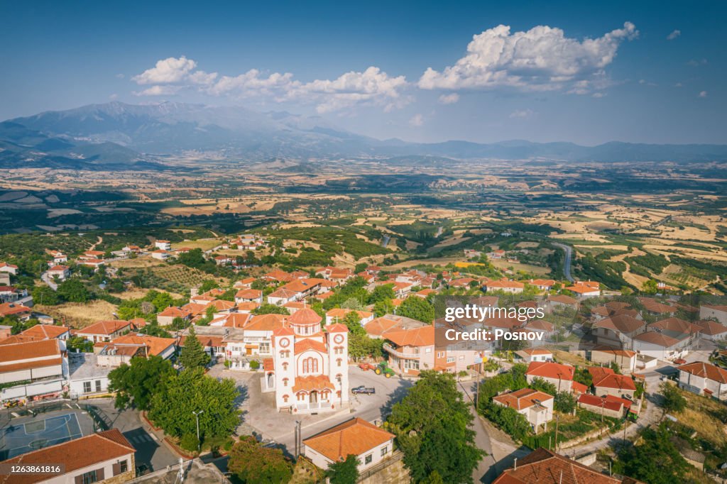 Greek Orthodox church in the Villge of Sarantaporo and Mount Olympus