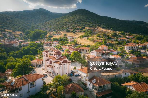 greek orthodox church in the villge of sarantaporo and mount olympus - mount olympus greece imagens e fotografias de stock