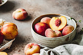 Ripe peaches in a bowl