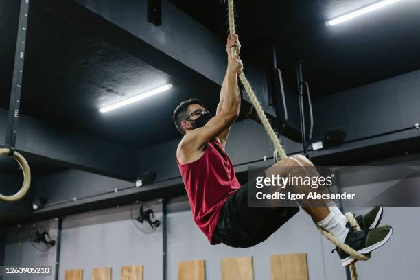 covid19: athlete in rope training - altitude sickness stock pictures, royalty-free photos & images