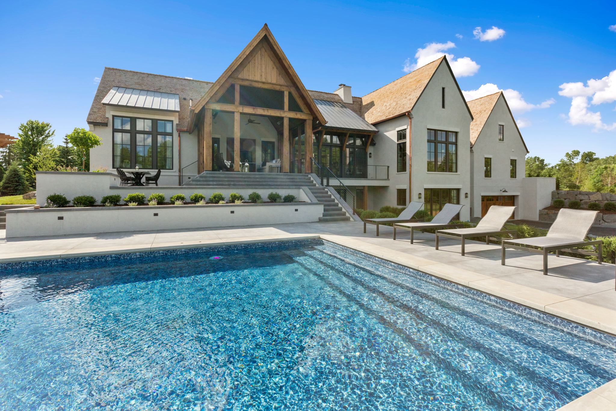 Beautiful day to be spent poolside in the back of your luxury home Beautiful day to be spent poolside in the back of your luxury home
