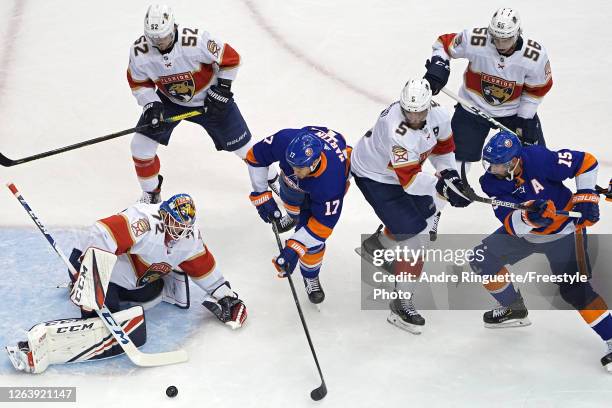 Goalie Sergei Bobrovsky of the Florida Panthers makes a save on Matt Martin of the New York Islanders during the first period in Game Two of the...