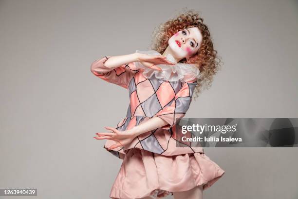 female harlequin looking at camera - harlequin stock pictures, royalty-free photos & images