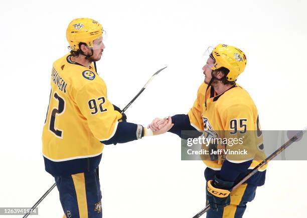 Ryan Johansen and Matt Duchene of the Nashville Predators celebrate the 4-2 win over the Arizona Coyotes after Game Two of the Western Conference...