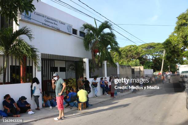 People line up as health department opens 300 nursing jobs on August 4, 2020 in Cancun, Mexico. 1000 nursing specialists went to the Training and...