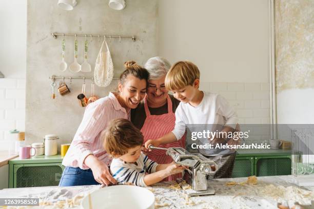 making grandma's pasta - homemade pasta stock pictures, royalty-free photos & images