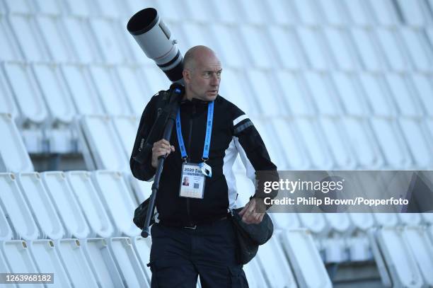 Adrian Dennis, a photographer with AFP looks on during the third one-day international between England and Ireland at the Ageas Bowl on August 04,...