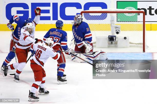 Warren Foegele of the Carolina Hurricanes celebrates after scoring a goal on Igor Shesterkin of the New York Rangers during the third period in Game...