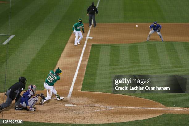 Stephen Piscotty of the Oakland Athletics hits a walk-off grand slam to win the game against the Texas Rangers at Oakland-Alameda County Coliseum on...