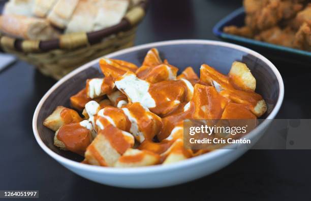 patatas bravas and alioli - patatas bravas stock pictures, royalty-free photos & images