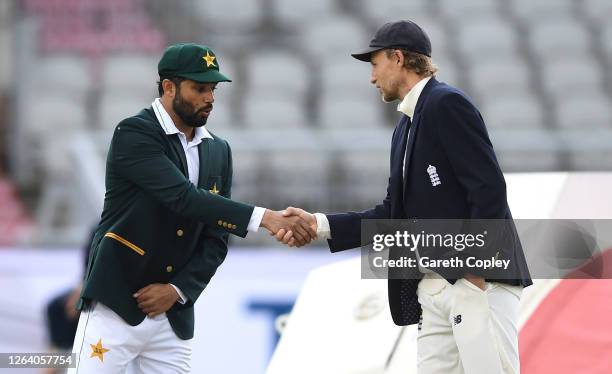 England captain Joe Root shakes hands with Pakistan captain Azhar Ali during the toss prior to Day One of the 1st #RaiseTheBat Test Match between...