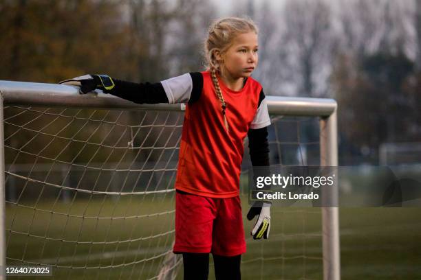 young female soccer girl during football training - soccer team coach stock pictures, royalty-free photos & images