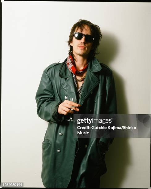 Guns N' Roses, photo shoot at Roppongi Prince Hotel in Tokyo, Japan, December 1988. Izzy Stradlin .