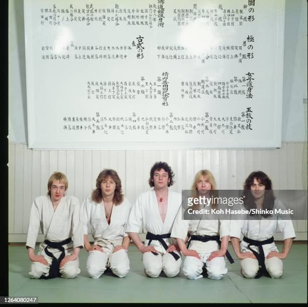 Iron Maiden, members wearing Japanese Judo uniform during their first visit Japan, Nippon Budokan, Tokyo, Japan, May 1981. Clive Burr , Adrian Smith...