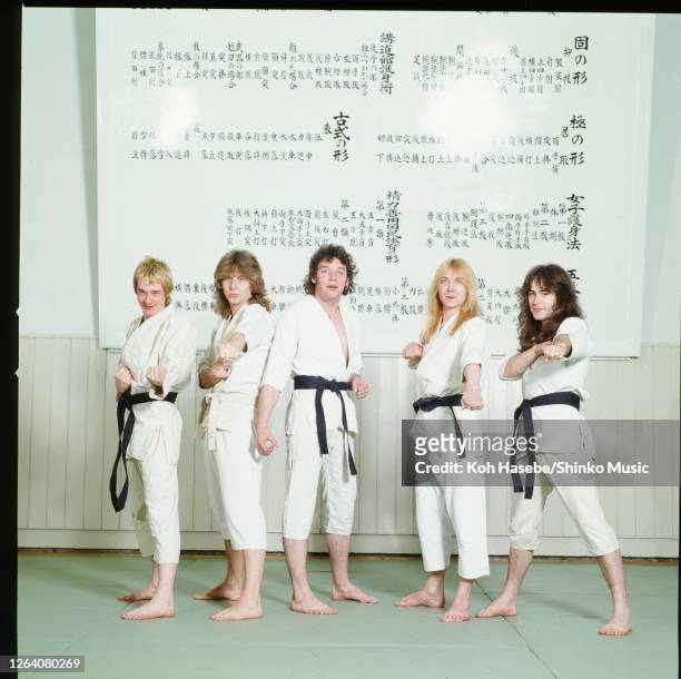 Iron Maiden, members wearing Japanese Judo uniform during their first visit Japan, Nippon Budokan, Tokyo, Japan, May 1981. Clive Burr , Adrian Smith...