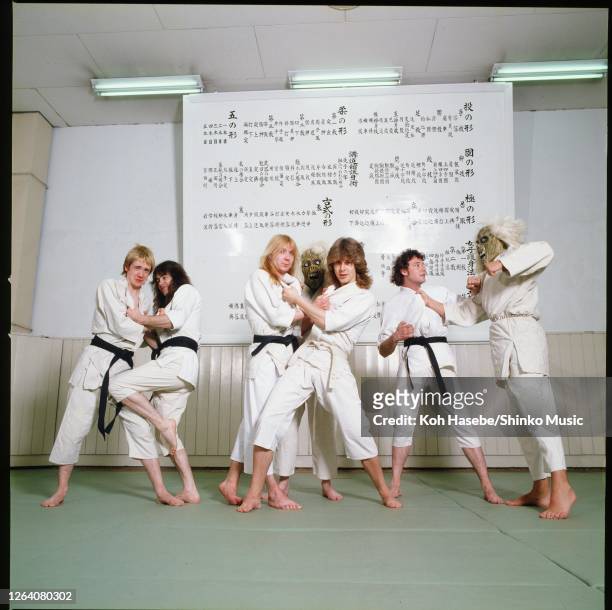 Iron Maiden, members wearing Japanese Judo uniform during their first visit Japan, Nippon Budokan, Tokyo, Japan, May 1981. Adrian Smith , Steve...