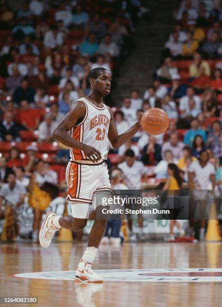 Gary Payton, Guard for the Oregon State Beavers dribbles the ball down court during the NCAA Pac-10 Conference college basketball game against the...