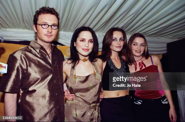 Jim Corr, Andrea Corr, Sharon Corr and Caroline Corr of The Corrs pose backstage at Netaid Charity Concert for Third World Debt, Wembley Stadium,...