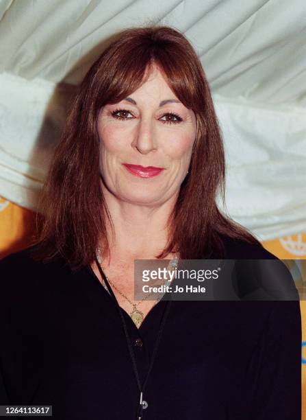 Angelica Huston poses backstage at Netaid Charity Concert for Third World Debt, Wembley Stadium, London, United Kingdom, 9 October, 1999.