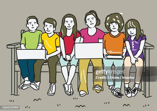 children holding laptop and sitting on bench - asian child ipad stock illustrations