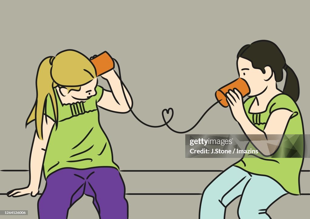 Two Girls Playing with Tin Can Telephone