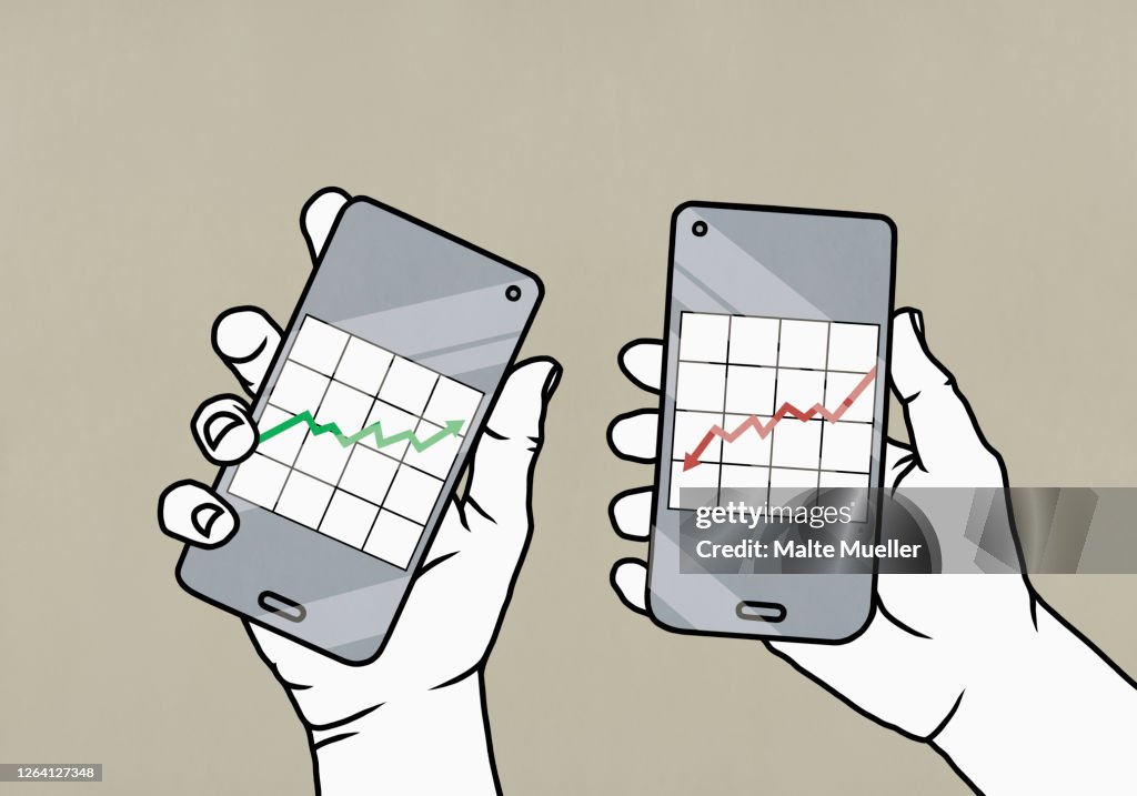 POV Hands holding conflicting investment data charts on smart phone screens